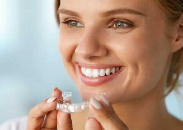 Maintain Healthy, Clean, White Teeth After Braces and Invisalign Treatment. straighten teeth orthodontist Invisalign teenagers